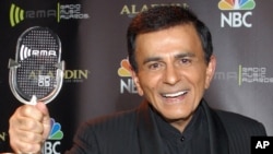FILE - Casey Kasem poses for photographers after receiving the Radio Icon award during The 2003 Radio Music Awards in Las Vegas. Kasem died at the age of 82, June 15, 2014. 