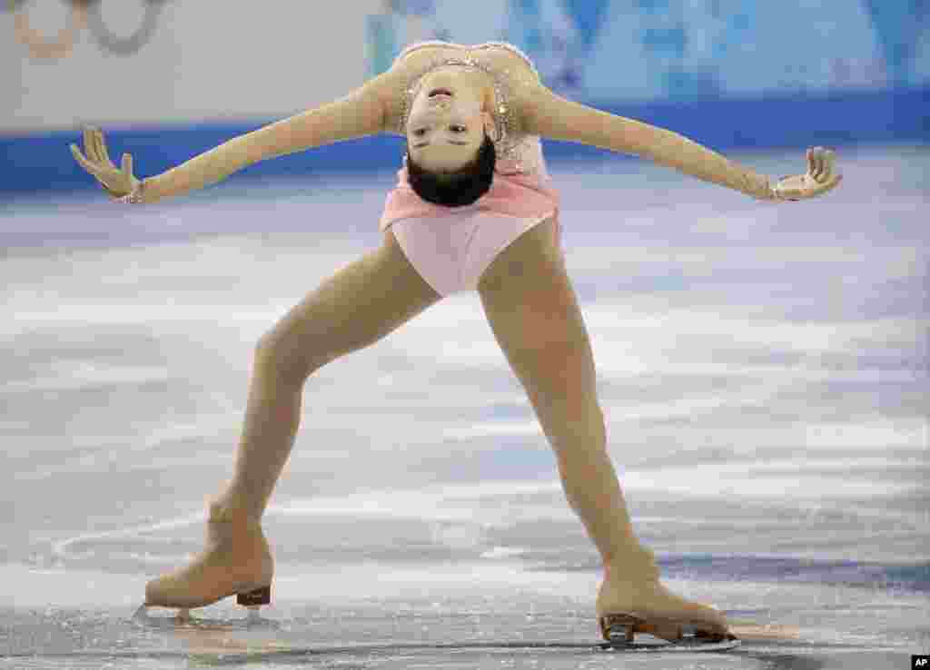 Li Zijun of China competes in the women's free skate figure skating finals at the Iceberg Skating Palace during the 2014 Winter Olympics, Feb. 20, 2014.