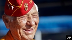 FILE - Former United States Marine and Navajo Code Talker Roy Hawthorne Sr. listens during a ceremony honoring the code talkers' contribution to the WWII U.S. effort, at Camp Pendleton, California, Sept. 28, 2015.