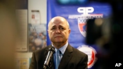 FILE - French Interior Minister Bruno Le Roux addresses the news media during a visit to Bobigny, a suburb north of Paris, France, Dec. 22, 2016.