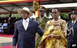 Uganda's long-time president Yoweri Museveni, 71, left, and his wife Janet Museveni, right, attend his inauguration ceremony in the capital Kampala, May 12, 2016.