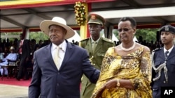 Uganda's long-time president Yoweri Museveni, 71, left, and his wife Janet Museveni, right, attend his inauguration ceremony in the capital Kampala, May 12, 2016. 