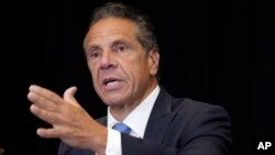 FILE - Then-New York Governor Andrew Cuomo speaks during a news conference at New York's Yankee Stadium, July 26, 2021.