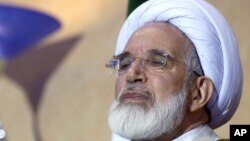 FILE- Iran's former parliament speaker, opposition cleric Mehdi Karroubi.