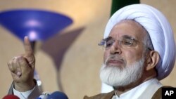 FILE- Iran's former parliament speaker, opposition cleric Mehdi Karroubi.