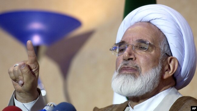 FILE- Iran's former parliament speaker, opposition cleric Mehdi Karroubi.