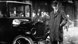 Henry Ford with a Model T in Buffalo, New York, in 1921. About one million Model Ts were produced that year. The car was introduced on October 1, 1908.
