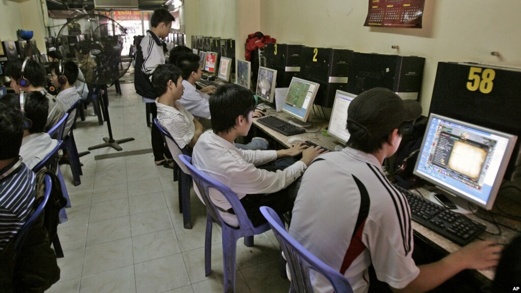 FILE - Students surf web at an Internet cafe in Hanoi, Vietnam, March 31, 2010. (AP Photo/Tran Van Minh)