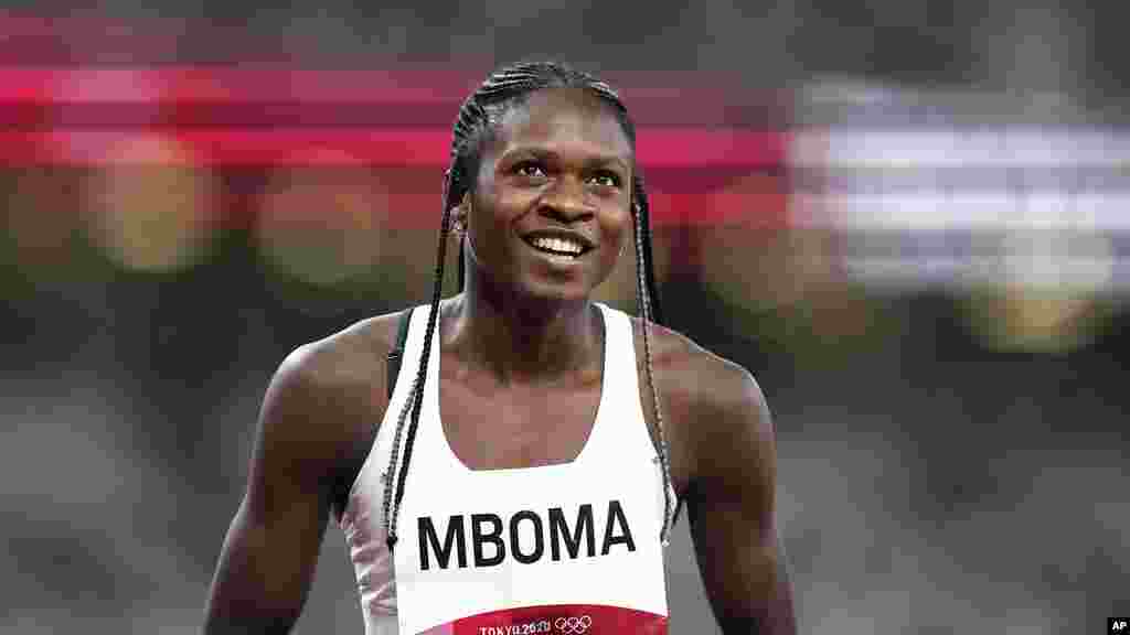 Christine Mboma, of Namibia, reacts after a semifinal of the women&#39;s 200-meters at the 2020 Summer Olympics, Monday, Aug. 2, 2021, in Tokyo. (AP Photo/Petr David Josek)