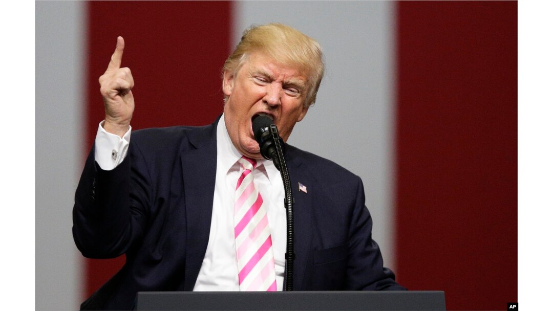 President Donald Trump speaks at a campaign rally in support of Sen. Luther Strange, Friday, Sept. 22, 2017, in Huntsville, Alabama.