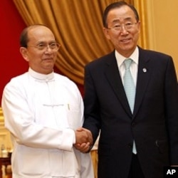 Burma's President Thein Sein (L) and United Nations Secretary-General Ban Ki-moon shake hands before their meeting.