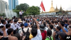 A student activist speaks during a rally protesting constitutional amendments June 30, 2015, in downtown Yangon, Myanmar.