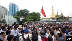 In Myanmar, also known as Burma, a student activist speaks during a protest of constitutional amendments, downtown Yangon, June 30, 2015.