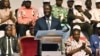 Le président ivoirien et chef du nouveau parti du Rassemblement des houphouétistes pour la démocratie et la paix (RHDP), Alassane Ouattara, prononce un discours lors d'une réunion à Abidjan le 16 juillet 2018.