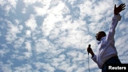 FILE - Merera Gudina addresses supporters at a rally in the Oromia region of Ethiopia, May 15, 2010. 