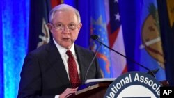 FILE - U.S. Attorney General Jeff Sessions speaks at the National Association of Attorneys General Winter Meeting in Washington, Feb. 27, 2018. 