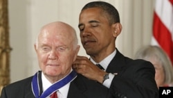 President Barack Obama awards the Medal of Freedom to astronaut John Glenn during a ceremony in the East Room of the White House, May 29, 2012 (AP).