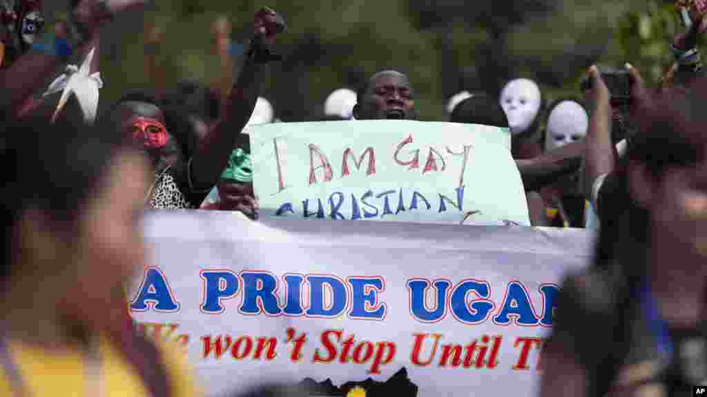 Ugandans take part in the 3rd Annual Lesbian, Gay, Bisexual and Transgender (LGBT) Pride celebrations in Entebbe, Aug. 9, 2014.