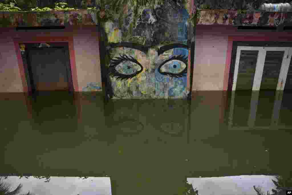 A house is seen partially submerged as flood waters recede in Kuttanad, Alappuzha in the southern state of Kerala, India.