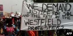 FILE - People demonstrate on April 16, 2016 in Banjul following the death of an opposition figure. A senior figure in Gambia's main opposition has died in custody after leading a protest for electoral reform and the resignation of strongman President Yahya Jammeh, his party and a rights group said Saturday.