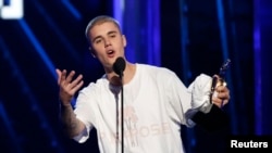 Justin Bieber accepts the award for Top Male Artist at the 2016 Billboard Awards in Las Vegas, Nevada.