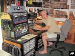 Jake Rohrer in his garage recording studio