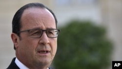 French President Francois Hollande delivers a speech after a high-level security meeting at the Elysee Palace in Paris, June 26, 2015.