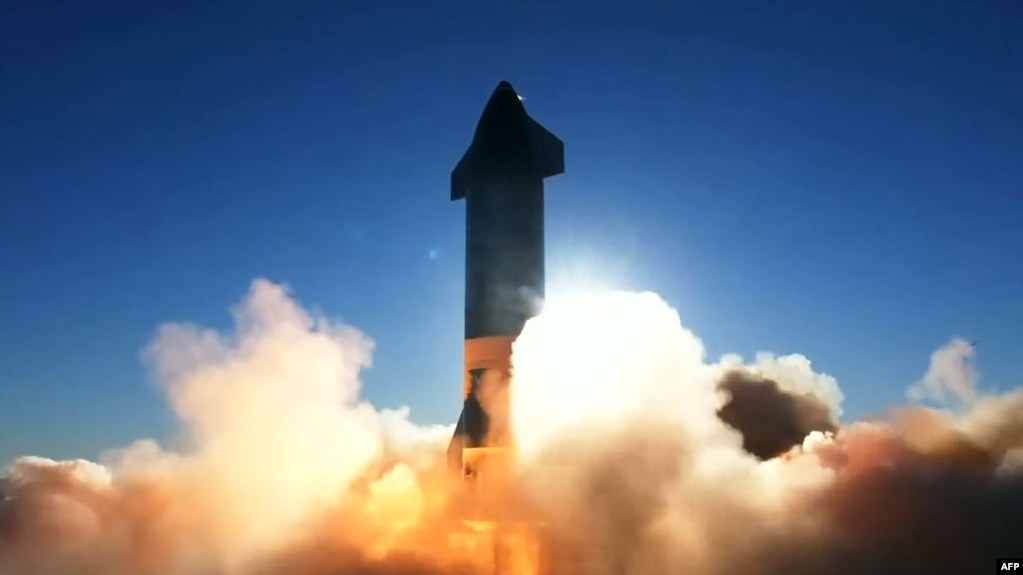 This SpaceX video frame grab image shows SpaceX's Starship SN8 rocket prototype taking off at the company's Boca Chica, Texas facility during an attempted high-altitude launch test on December 9, 2020. (Photo by - / SPACEX / AFP) 