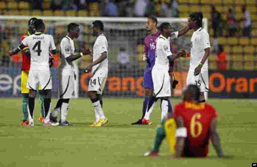 The Ghana team celebrates after beating Guinea in their African Nations Cup Group D soccer match at Franceville Stadium February 1, 2012.