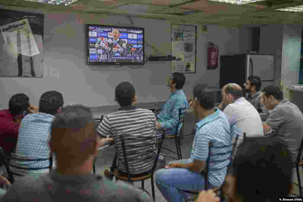 After Egypt&rsquo;s disqualification in Russia, Egyptian football fans watch a press conference at the headquarters of the Eyptian Football Association, where EFA President Hani Abo Rida explains the shortcomings of the team and its sponsors.