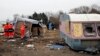Migrants Occupy Shanty Rooftops to Protest Calais Demolition