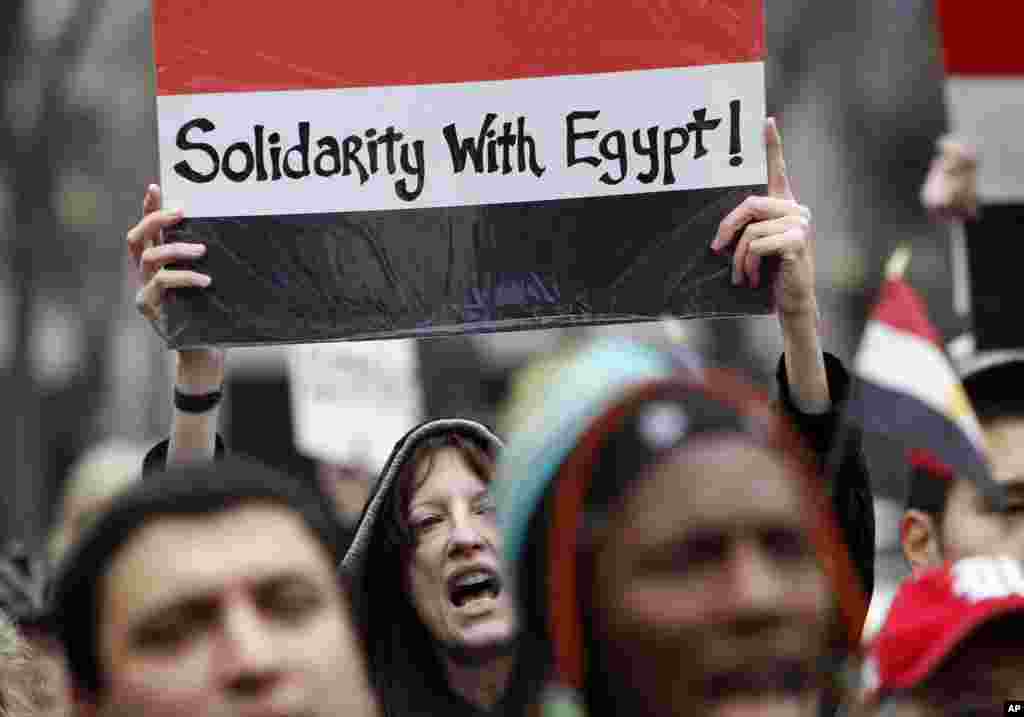 A protester chants during a demonstration in support of ousting Egyptian President Hosni Mubarak, Feb. 5, 2011, in Seattle.