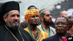Various leaders from different faith communities attend the faith-based Climate Justice Rally at the ABSA Kingspark Rugby stadium in Durban, November 27, 2011. 