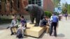 People move about the campus of the University of California, Los Angeles, April 26, 2019. Some students and employees possibly exposed to measles at two Los Angeles universities were still quarantined on campus or told to stay home Friday, but the number was dwindling.