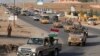 Iraq Peshmerga Fighters Head to Kobani