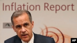FILE - Bank of England Governor Mark Carney speaks during the central Bank's quarterly Inflation report at the Bank of England in the City of London, May 11, 2017.