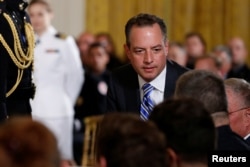 Former White House Chief of Staff Reince Priebus takes his seat for a ceremony recognizing the first responders to the June 14 shooting involving Congressman Steve Scalise, at the White House in Washington, U.S. July 27, 2017.