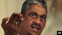 Sri Lanka's former army chief Sarath Fonseka gestures while speaking during a media briefing in Colombo, Sri Lanka, June 14, 2012.
