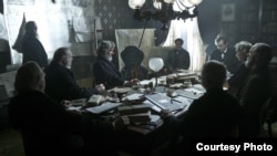 President Lincoln (Daniel Day-Lewis, far right) meets with his Cabinet to discuss the planned attack on Fort Fisher in this scene from director Steven Spielberg's drama "Lincoln" from DreamWorks Pictures and Twentieth Century Fox.