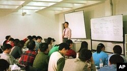 Kalun Tse, an economist, teaches a finance class at the China-Europe International Business School in Shanghai. The school is one of a growing number of U.S.- and European-run business schools being established in China, (File).