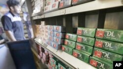 FILE - This May 17, 2018 file photo shows packs of menthol cigarettes and other tobacco products at a store in San Francisco. On Thursday, April 29, 2021, the Food and Drug Administration pledged again to try to ban menthol cigarettes, this time under pre