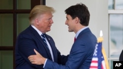 L'ancien président Donald Trump et le Premier ministre canadien Justin Trudeau à la Maison Blanche le 20 juin 2019 (AP Photo/Alex Brandon)