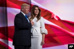 Republican presidential candidate Donald Trump gives a thumbs up after his wife, Melania, spoke during the Republican National Convention in Cleveland, July 18, 2016.