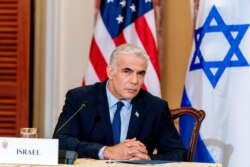 以色列外长拉皮德（ Yair Lapid）在记者会上。