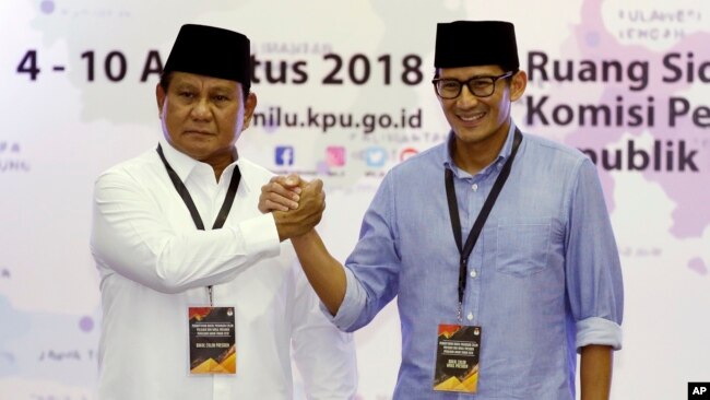 Capres Prabowo Subianto dan Cawapres Sandiaga Uno (Foto: AP).