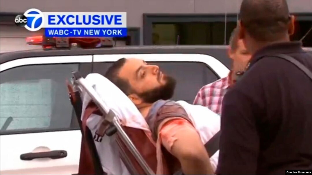 A still image captured from a video from WABC television shows a conscious man believed to be New York bombing suspect Ahmad Khan Rahami being loaded into an ambulance after a shoot-out with police in Linden, New Jersey, Sept. 19, 2016.