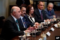 Iraqi Prime Minister Haider al-Abadi speaks during a meeting with President Donald Trump in the Cabinet Room of the White House, March 20, 2017.