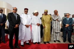 FILE: In this pictured taken Monday, July 2, 2018, left to right : Mauritania President Mohamed Ould Abdel Aziz, Niger President Mahamadou Issoufou, Mali President Ibrahim Boubacar Keita, Chad President Idriss Deby, Burkina Faso President Roch Marc Christian Ka