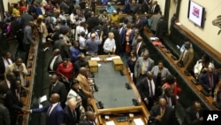 Members of the House of Assembly sit inside the Zimbabwean Parliament in Harare, Nov. 21 2017. 