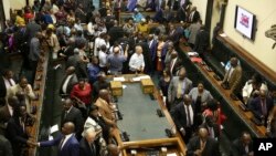 Members of the House of Assembly sit inside the Zimbabwean Parliament in Harare, Nov. 21 2017. 